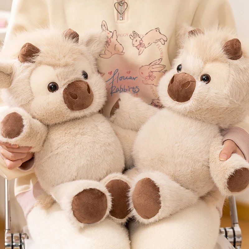 La peluche qui court — vache câline